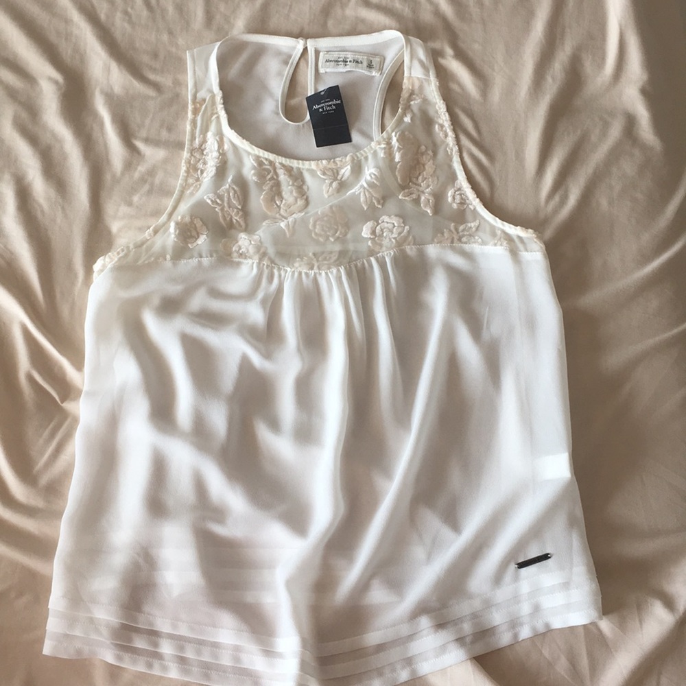 White tank with floral pattern